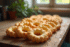Biscuits à la madeleine fraîchement cuits sur une table en bois